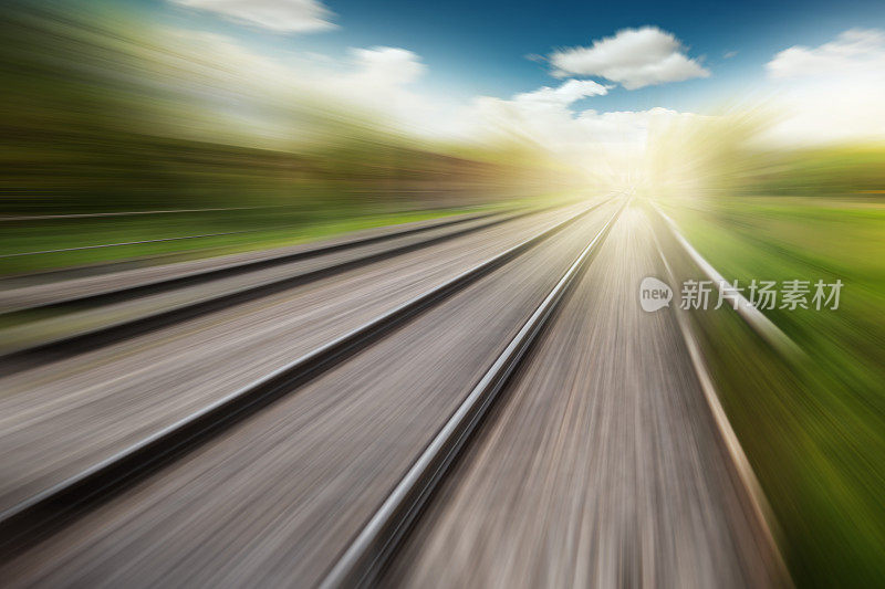railroad tracks at motion blur perspective